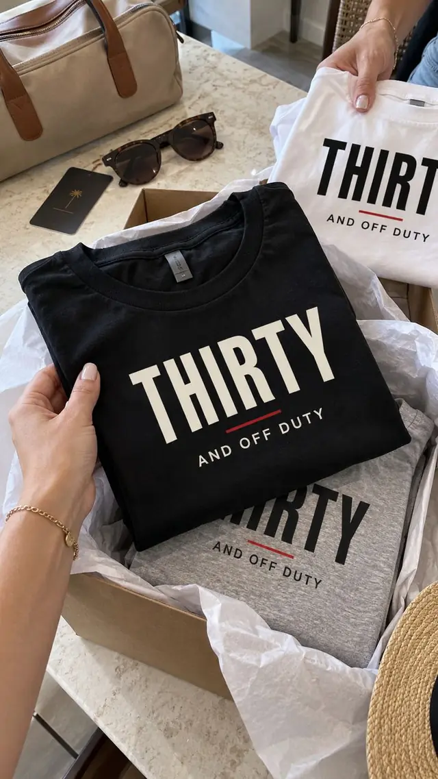 Folded Thirty and Off Duty birthday tees in a box